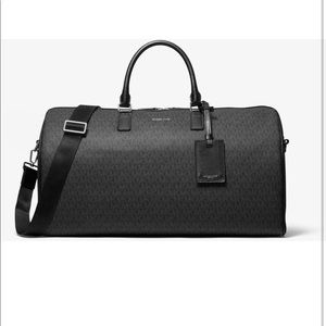 Large  Michael Kors weekend duffel bag.